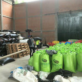 Visiting one of the receiving stations of CENFROCAFE around Jaen, Peru. Coffee is brought to the station in parchment, sorted & graded. The highest grade, APU(which is what we carry), is stored in green sacks.