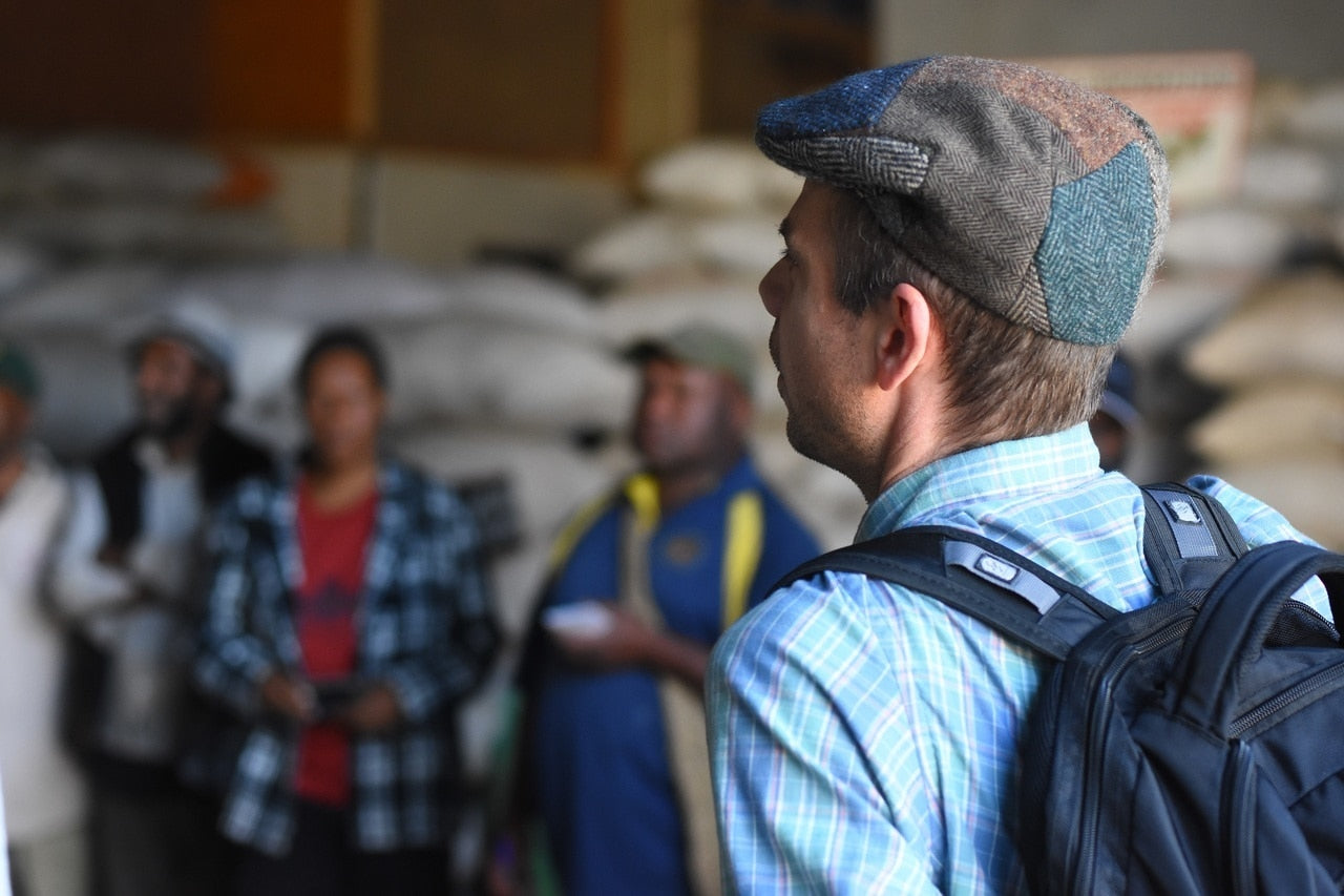 Roaster Scott introducing himself to the board members of the AAK Coop. AAK stands for Apo, Angra & Kange which stands for 'brother' in local dialects.